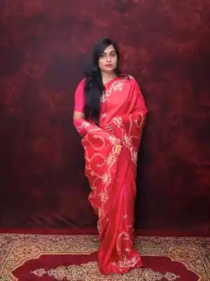 Step into elegance with this stunning Rani Pink embroidered saree, crafted in lightweight georgette fabric for a flowy and graceful drape. The saree is adorned with intricate white thread embroidery in floral and star motifs, adding a delicate charm to its vibrant hue. Perfect for festive occasions, cultural events, and special gatherings, this saree beautifully blends tradition with timeless sophistication